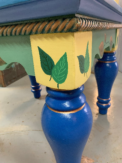Moroccan Style Side Table with copper blue greens leaves showing one corner from side by Lisa Johnson Arts in Norwich Vermont