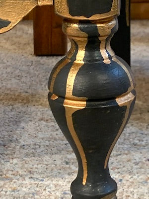 black leg with copper drips on blue hand-painted antique blanket chest, created by Lisa Johnson Arts Norwich VT