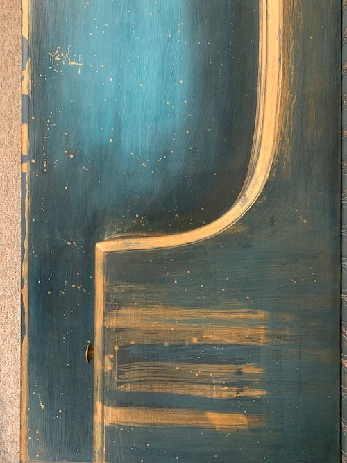 Blue hand-painted antique blanket chest with copper dripping down, looking from above down at the right hand side of the top surface, created by Lisa Johnson Arts Norwich VT