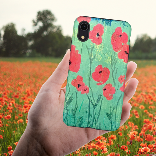 phone case with painted poppies against field of poppy