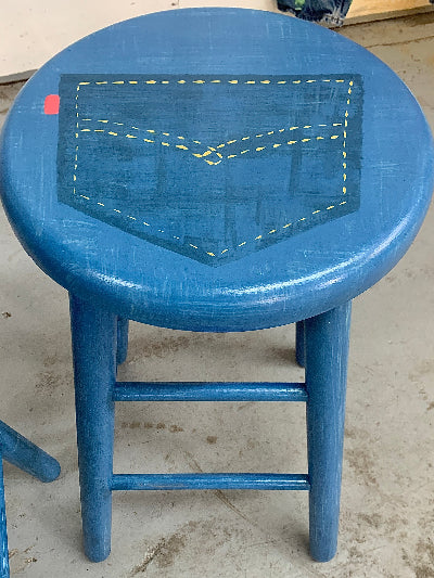 a maple barstool painted into faux blue jeans design by Lisa Johnson Arts in Norwich Vermont