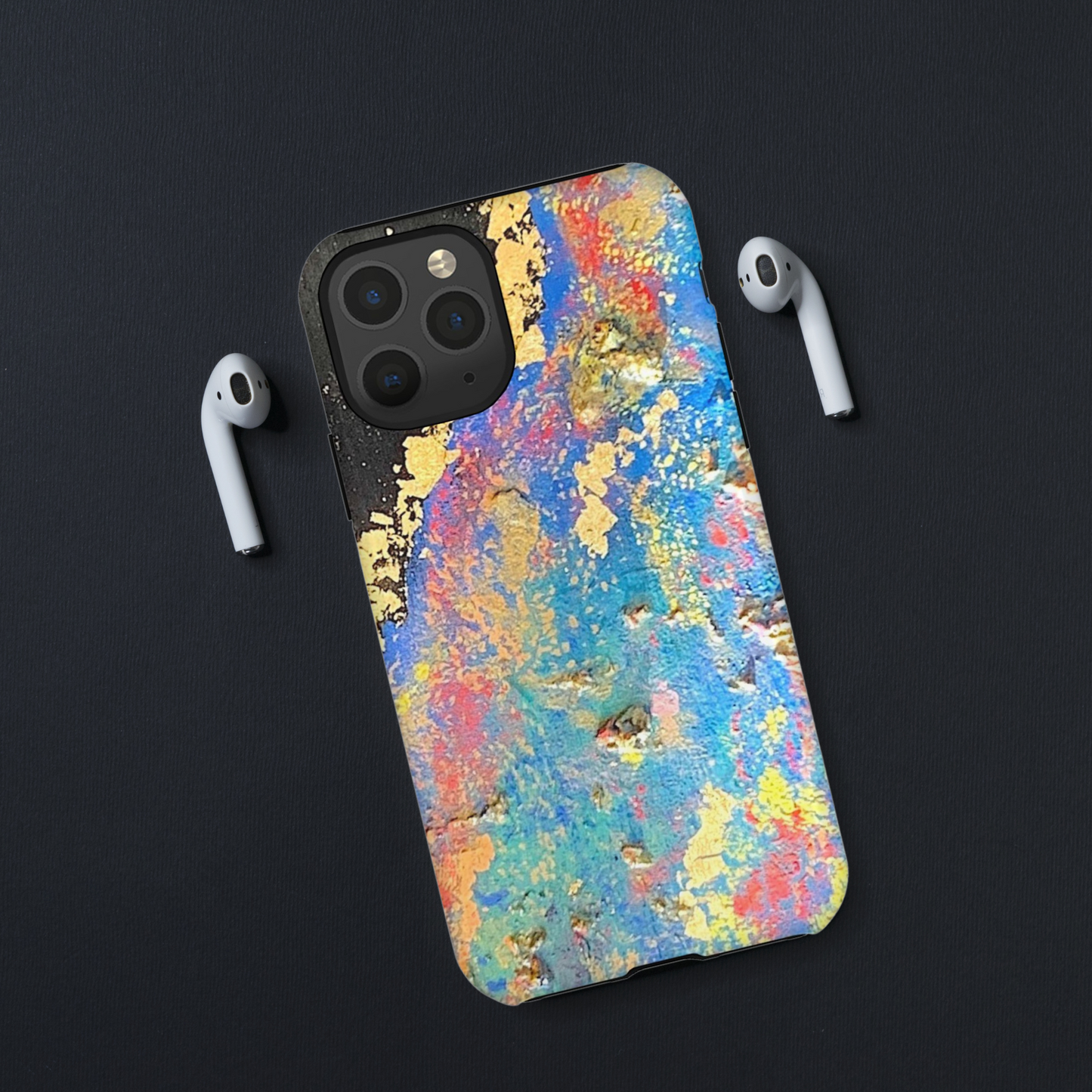 a phone case that looks like space exploded into a gold and colorful cosmic extravaganza